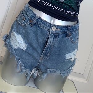Medium blue wash shorts distressed denim ripped